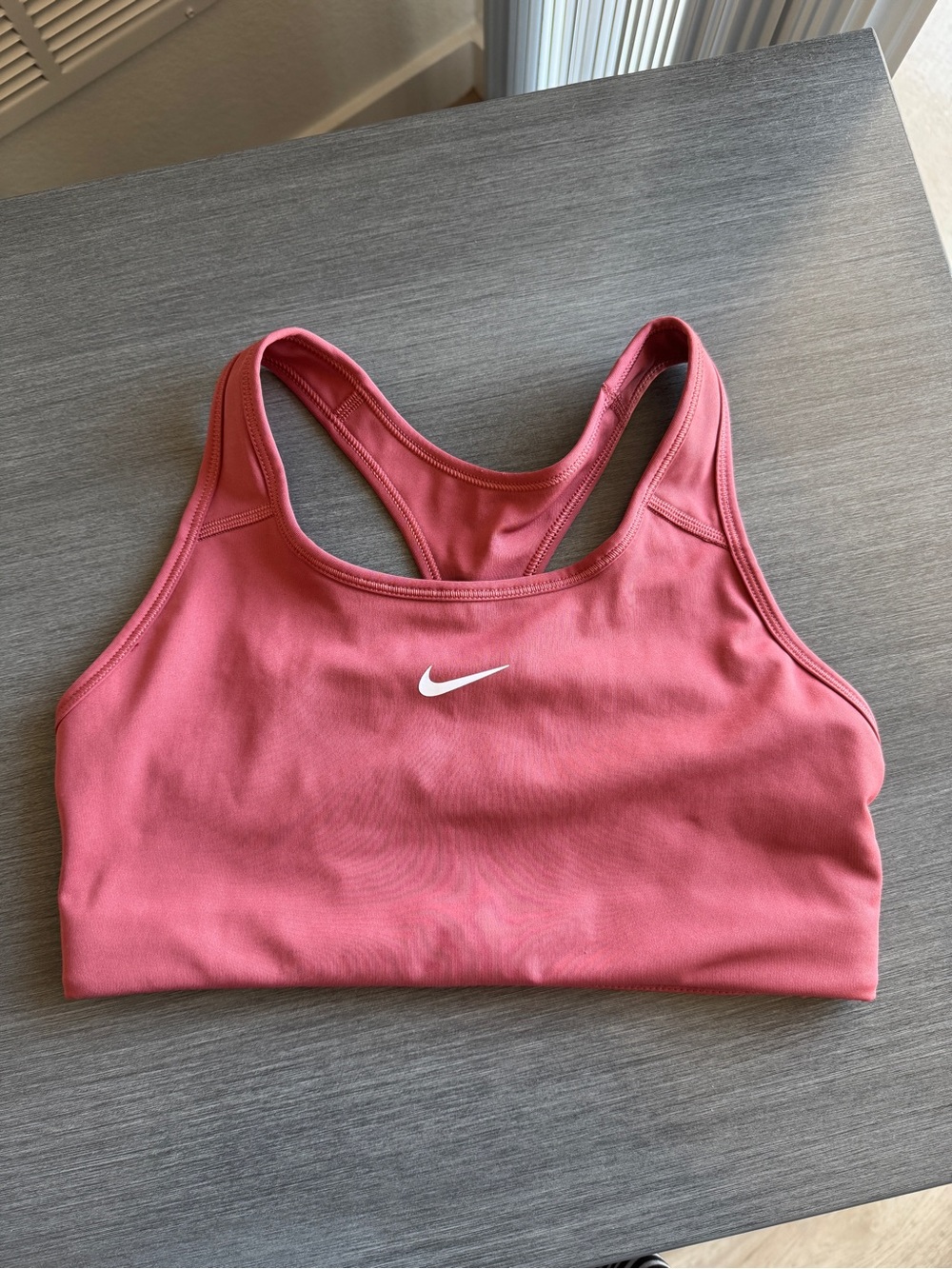 Nike Pink Racerback Sports Bra with White Swoosh
